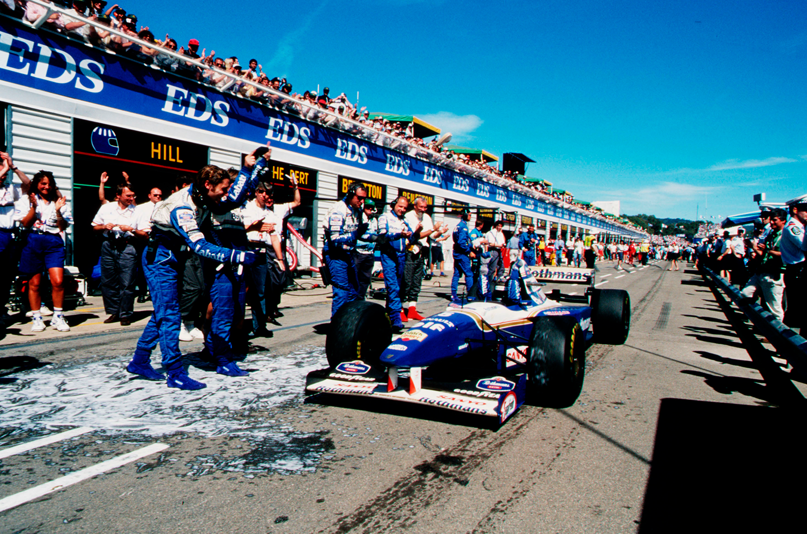 Damon Hill celebrates a 1995 season-ending victory in Adelaide with his team…